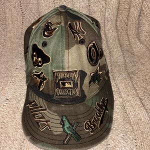 MLB Cooperstown Collection Camo Baseball Cap with Multi Team Embroidered Logos